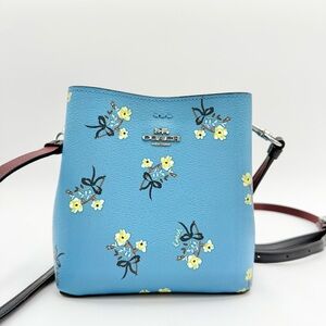 Coach NWOT Blue Crossbody Bag with Yellow Floral Design